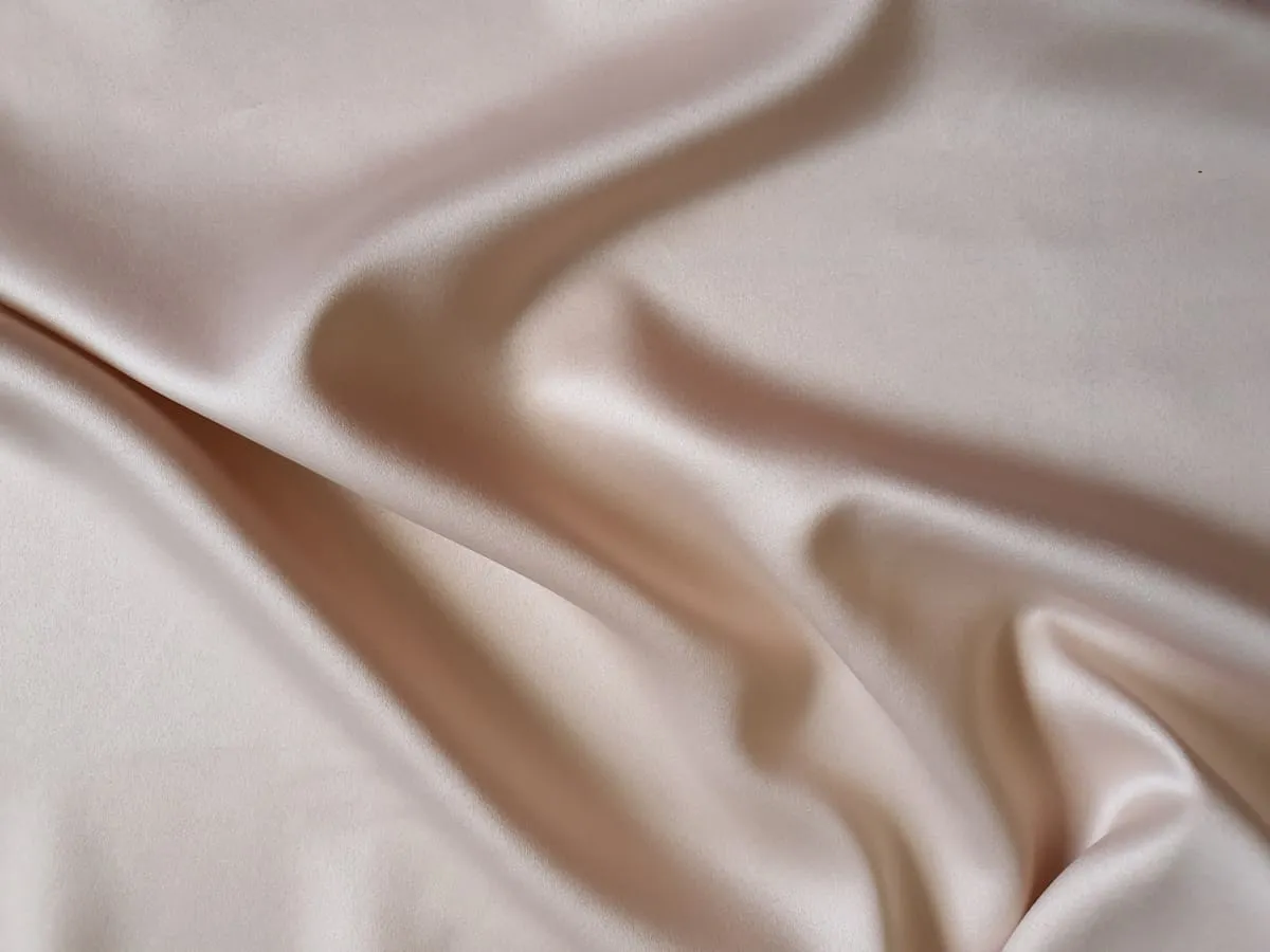 Champagne satin with a soft pearlescent sheen