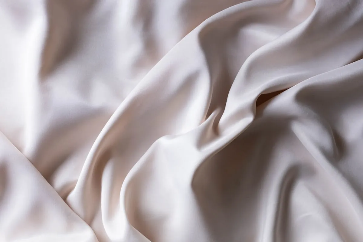 Silver satin folds in a neutral interior palette