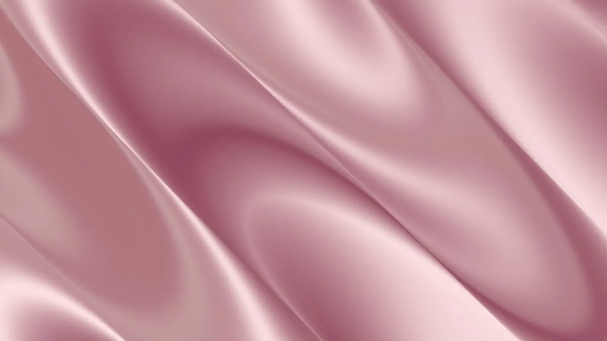 Dusty rose satin with a smooth polished surface